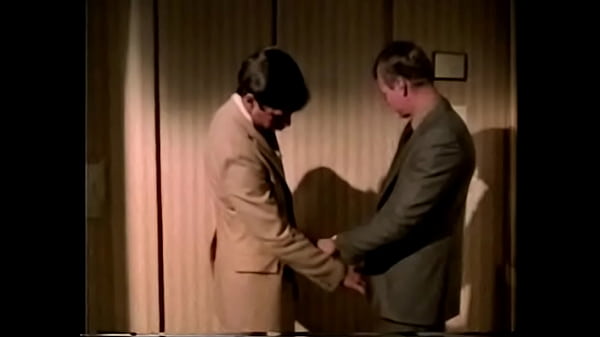 2 bus. men in elevator (vintage comp)